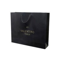 Custom black boutique paper gift bags with rope handles