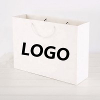 Customized Cheap Luxury White Cardboard  Retail Merchandise Shopping Packaging Paper Bags For Clothes / Clothing Packing